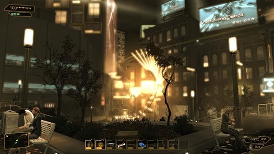 A futuristic city (Detroit), with a sculpture of a wing in golden lights in the centre
