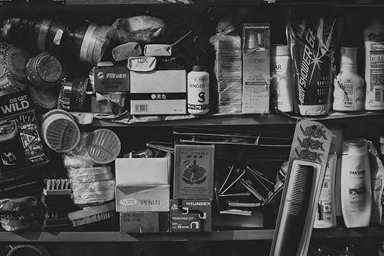 grayscale photography of assorted cosmetic products