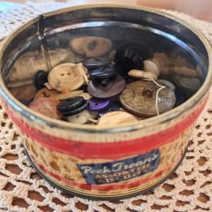 vintage Peek Freans tin full of old buttons 