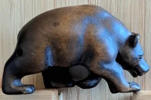 photo of small wooden bear