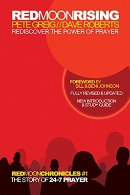 Red Moon Rising cover art. Image: blackk-silhouetted people facing a red sky with a red moon in the top right. A darker circle beneath with text about foreward, revision, update information.