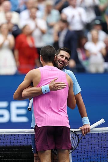 Novak Djokovic of Serbia greets Carlos Alcaraz of Spain following their Men's Semifinal match on Day Thirteen of the 2025 US Open at USTA Billie Jean...