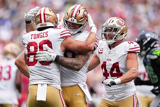 San Francisco 49ers tight end Jake Tonges (88) celebrates with...