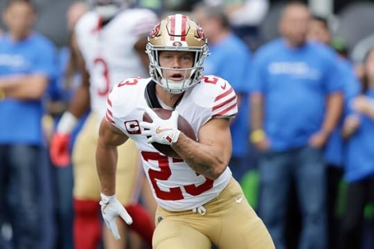 San Francisco 49ers running back Christian McCaffrey (23) warms up before an NFL football game against the Seattle Seahawks, Sunday, Sept. 7, 2025, in Seattle. (AP Photo/John Froschauer)