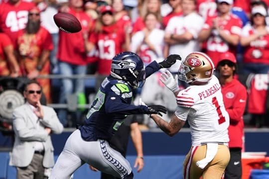 San Francisco 49ers wide receiver Ricky Pearsall (1) makes a catch during the second half of an NFL football game against the Seattle Seahawks, Sunday, Sept. 7, 2025, in Seattle. (AP Photo/Lindsey Wasson)