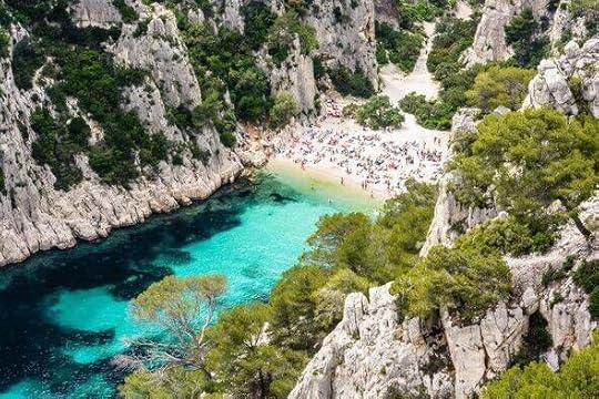 View from above of the calanque of En-Vau, a hard-to-reach narrow natural creek with white sandy beach close to Marseille and Ca