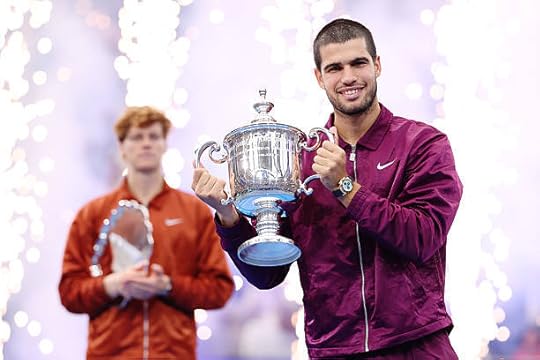Carlos Alcaraz of Spain poses with his trophy after defeating Jannik Sinner of Italy during their Men's Singles Final match on Day Fifteen of the...