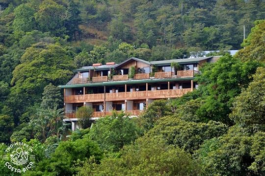 hotel belmar's main building with thick forest all around