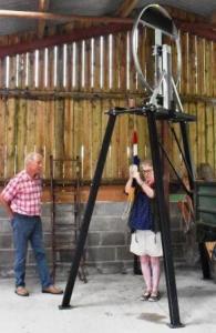 Debbie learning to ring bells on the dumb bell