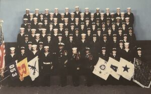 A company of new sailors posing for their group boot camp photo