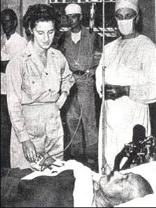 Hideki Tojo being treated by US medical personnel in Tokyo, Japan after his failed suicide attempt, 11 September 1945 (public domain via Wikipedia)