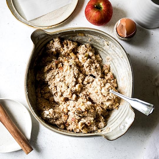 The apple scone dough in a mixing bowl after the diced apples have been folded in.