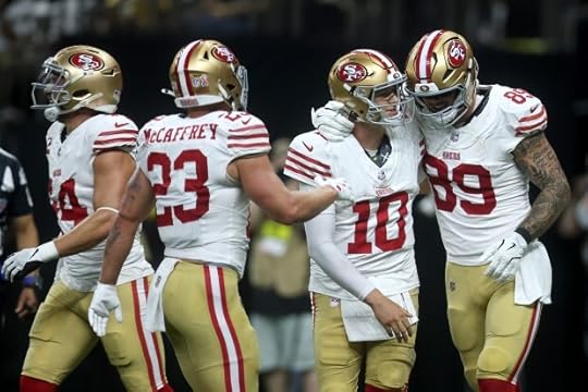 NEW ORLEANS, LOUISIANA - SEPTEMBER 14: Luke Farrell #89 of the San Francisco 49ers celebrates with Mac Jones #10 after scoring a touchdown reception against the New Orleans Saints during the first quarter in the game at Caesars Superdome on September 14, 2025 in New Orleans, Louisiana. (Photo by Chris Graythen/Getty Images)