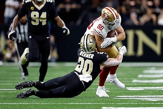 San Francisco 49ers tight end Jake Tonges (88) is tackled...