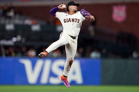 San Francisco Giants’ Willy Adames (2) tries to throw out...