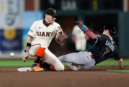 Arizona Diamondbacks’ Corbin Carroll (7) steals second base against San...