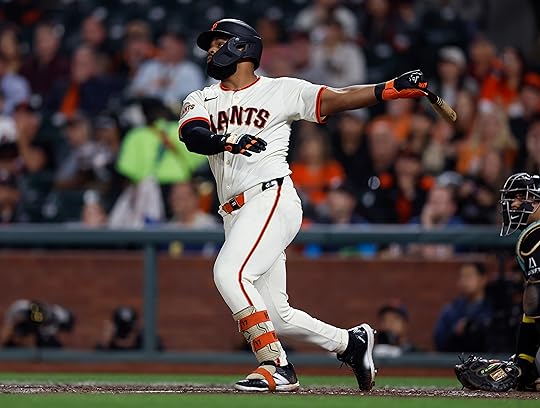 San Francisco Giants’ Heliot Ramos (17) hits a two-run home...