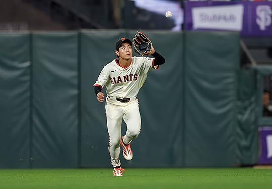 San Francisco Giants’ Jung Hoo Lee (51) makes a catch...