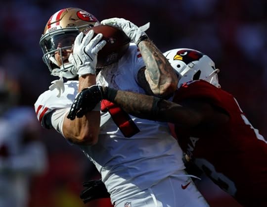 San Francisco 49ers' Ricky Pearsall (1) makes a 34-yard catch for a first down against Arizona Cardinals' Kei'Trel Clark (13) in the fourth quarter at Levi's Stadium in Santa Clara, Calif., on Sunday, Sept. 21, 2025. (Nhat V. Meyer/Bay Area News Group)