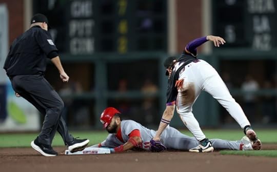 San Francisco Giants shortstop Willy Adames #2 tags out St. Louis Cardinals' Victor Scott II #11 on a steal attempt in the fourth inning of their MLB game at Oracle Park in San Francisco, Calif., on Tuesday, Sept. 23, 2025. He was initially called safe and after the play was reviewed he was called out. (Jane Tyska/Bay Area News Group)