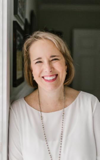 portrait of Sissy Goff who is leaning against a door frame