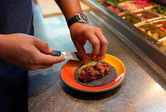 Plating the dish. (Alejandro Tamayo / The San Diego Union-Tribune)