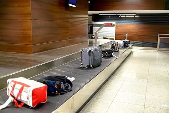 luggage on baggage carousel