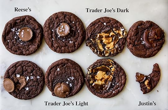 Recipe testing photo showing four brands of peanut butter cup cookies: Reese's, Trader Joe's Dark, Trader Joe's Light, and Justin's, side-by-side to compare melting results on chocolate cookie base.