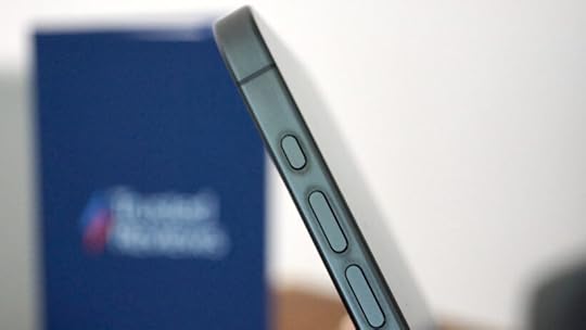 Side view of Apple iPhone 15 Pro's volume buttons and frame.