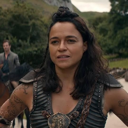 film screencap of holga kilgore, played by michelle rodriguez, with visible armpit hair