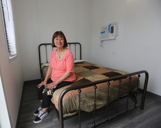 Betty Kwan Chinn sits in a housing unit at the Bayside Village Transitional Housing Project in Eureka. The unit, accessible by wheelchair, was being prepared for the first tenant recently. (Sage Alexander/Times-Standard)