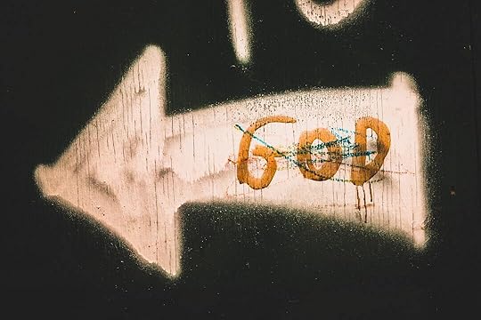 white and brown wooden wall with heart shaped graffiti