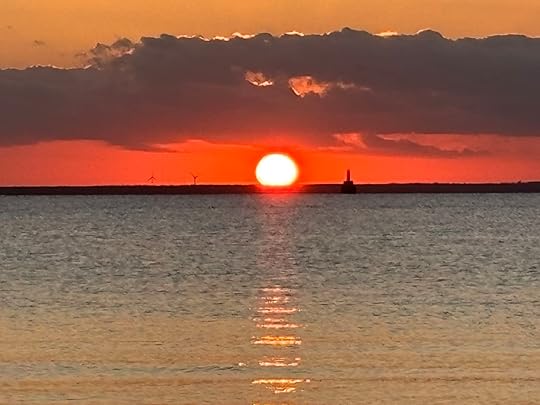 Beautiful orange sunset over the water.