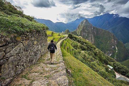 trekker approaching machu picchu