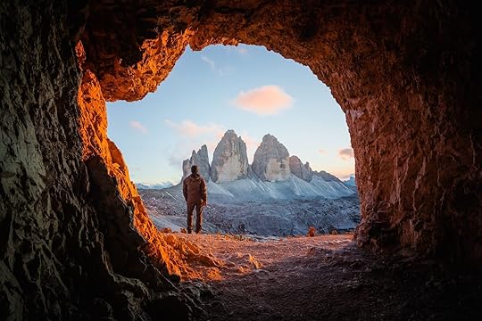 man in patagonia looking at peaks