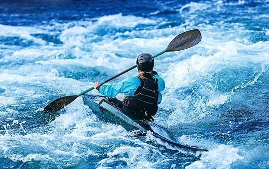 kayaker on whitewater river