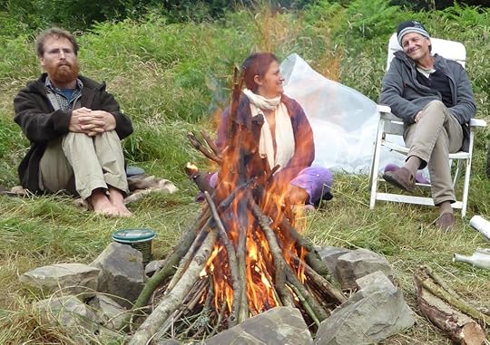 Looby, Jon Young and Pete McCowenround the fire