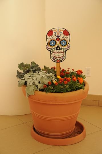 Dia de los Muertos skull in planter