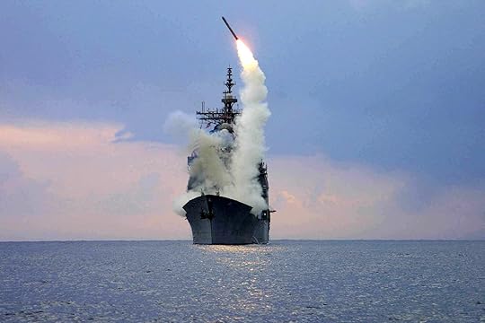 A Tomahawk Land Attack Missile (TLAM) is launched from the guided missile cruiser USS Cape St. Georg..