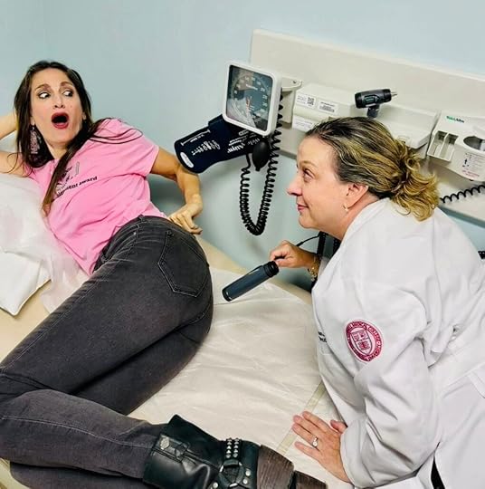 Doctor doing fake exam on Irene Bremis.