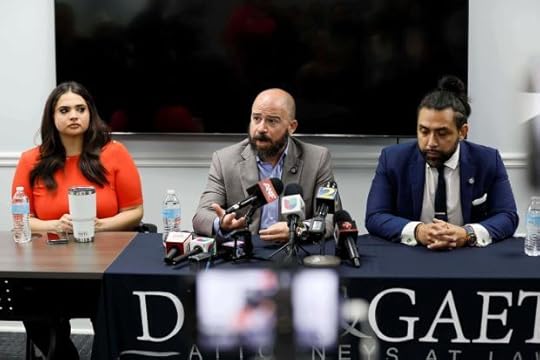 Giovanni Diaz, center, alongside Zacharias Gaeta and Katherine Guevara, speaks during a press conference about the status of Mario Guevara, a metro Atlanta-based Spanish-language reporter from MGNews, addressing his situation following his arrest while covering an immigration rally, Tuesday, June 17, 2025, in Smyrna, Ga. (Miguel Martinez/Atlanta Journal-Constitution via AP)