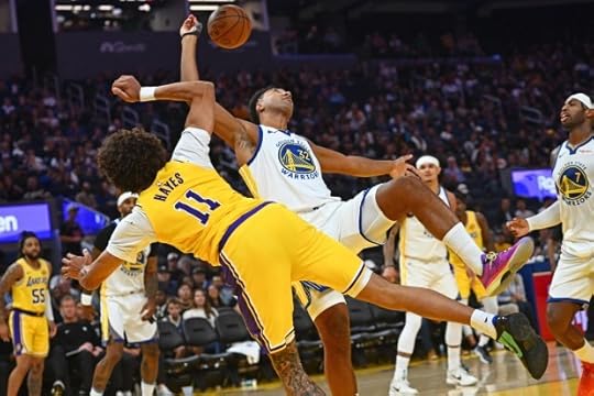 Golden State Warriors' Trayce Jackson-Davis (32) fouls Los Angeles Lakers' Jaxson Hayes (11) in the third quarter of their preseason NBA game at Chase Center in San Francisco, Calif., on Sunday, Oct. 5, 2025. (Jose Carlos Fajardo/Bay Area News Group)