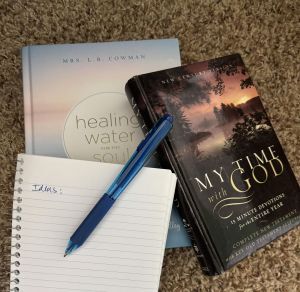 2 devotionals and a notebook