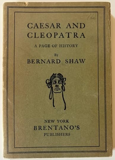 Old book of the play of Caesar and Cleopatra. There is a mask in the center, but no other graphics.