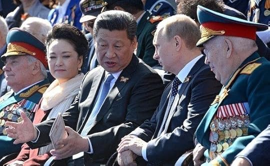 Chinese President Xi Jinping with Russian President Vladimir Putin during the Moscow Victory Day Parade May 9, 2015 (Wikimedia Commons)