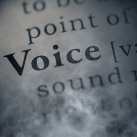 The definition of the word Voice being obscured by encroaching wisps of smoke.