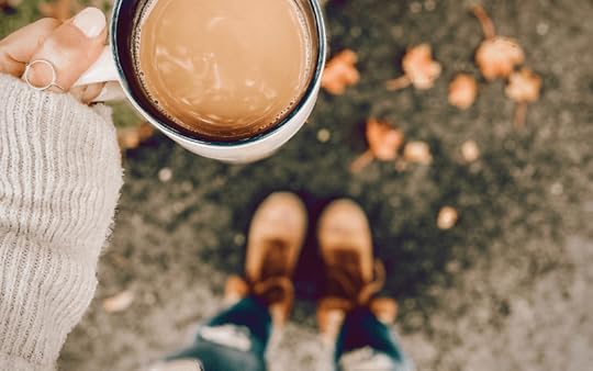 woman holding coffee
