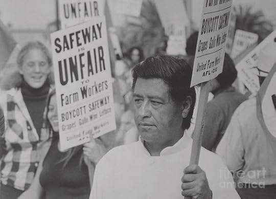 Photo of Cesar Chavez leading an action typical in farmworkers' strikes