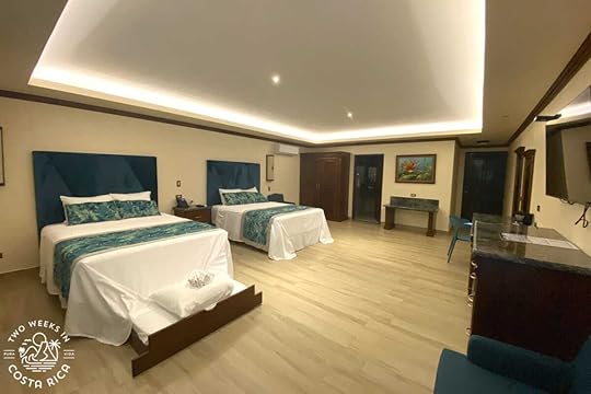 a large room with two beds