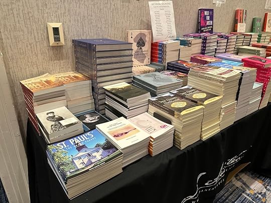 Stacks of copies of The Austens, Jane Austen’s Philosophy of the Virtues, St. Paul’s in the Grand Parade, Jane Austen and the North Atlantic, and The Custom of the Country